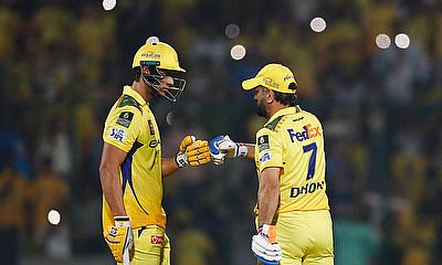 Chennai Super Kings' MS Dhoni bumps fists with Shivam Dube alt=