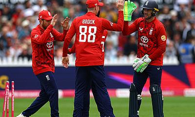 England's Jos Buttler celebrates with Harry Brook after stumping out West Indies' Shai Hope England's Jos Buttler celebrates with Harry Brook after stumping out West Indies' Shai Hope