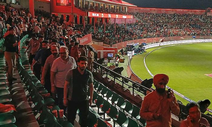 Spectators leave the ground after the IPL match between Punjab Kings and Delhi Capitals was abandoned IPL match between Punjab Kings and Delhi Capitals was abandoned