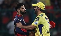 Royal Challengers Bengaluru' Virat Kohli shakes hands with Chennai Super Kings' MS Dhoni after the match