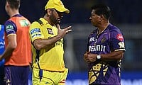 Chennai Super Kings' MS Dhoni speaks with Kolkata Knight Riders head coach Chandrakant Pandit after the match