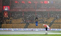 General view inside the stadium as the match is delayed due to rain