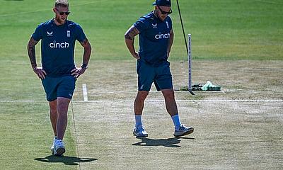 Ben Stokes (L) and coach Brendon McCullum