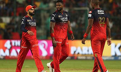 Royal Challengers Bengaluru' Virat Kohli, Romario Shepherd and Lungisani Ngidi speak in the field